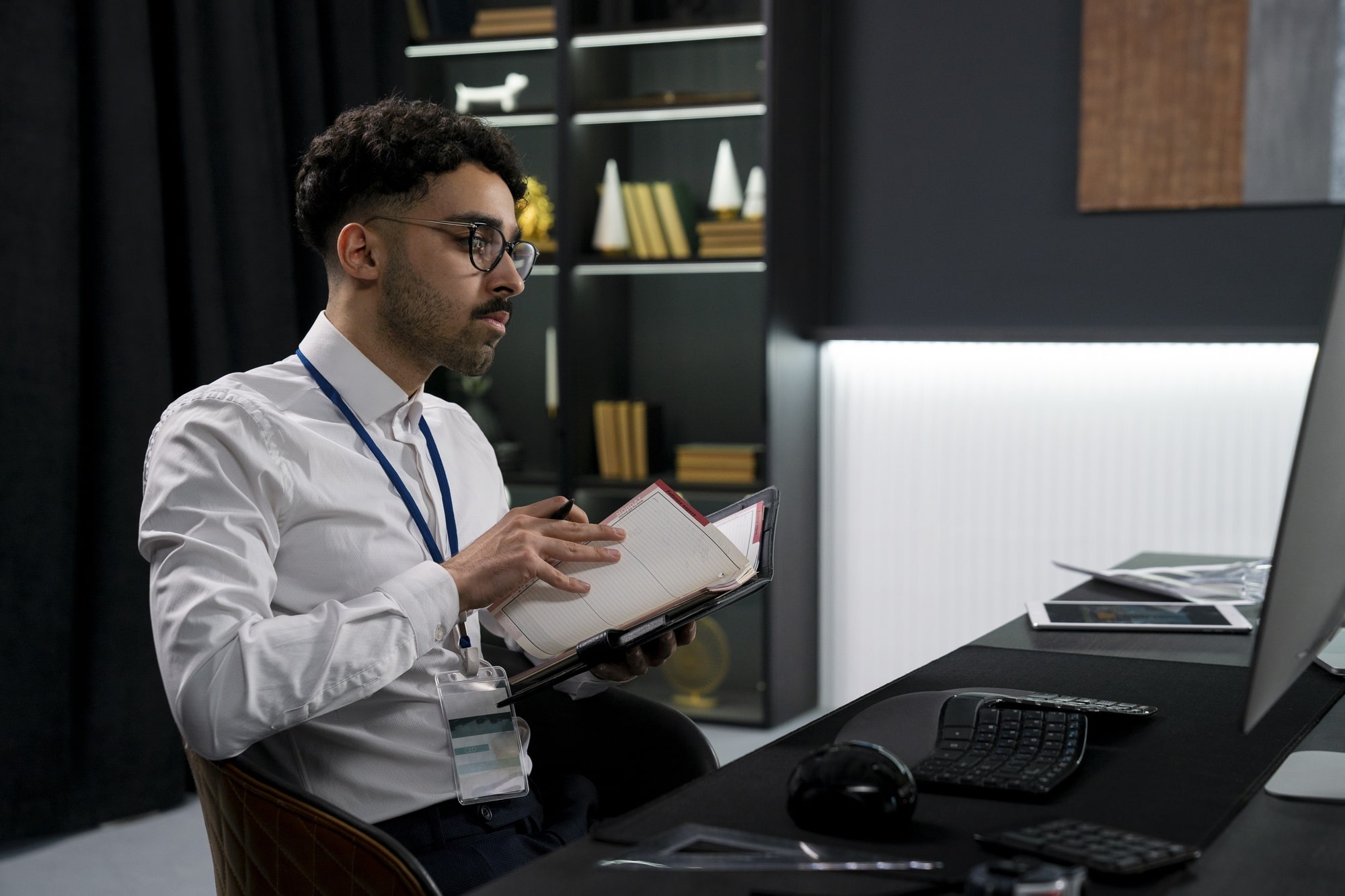medium shot man working desk min